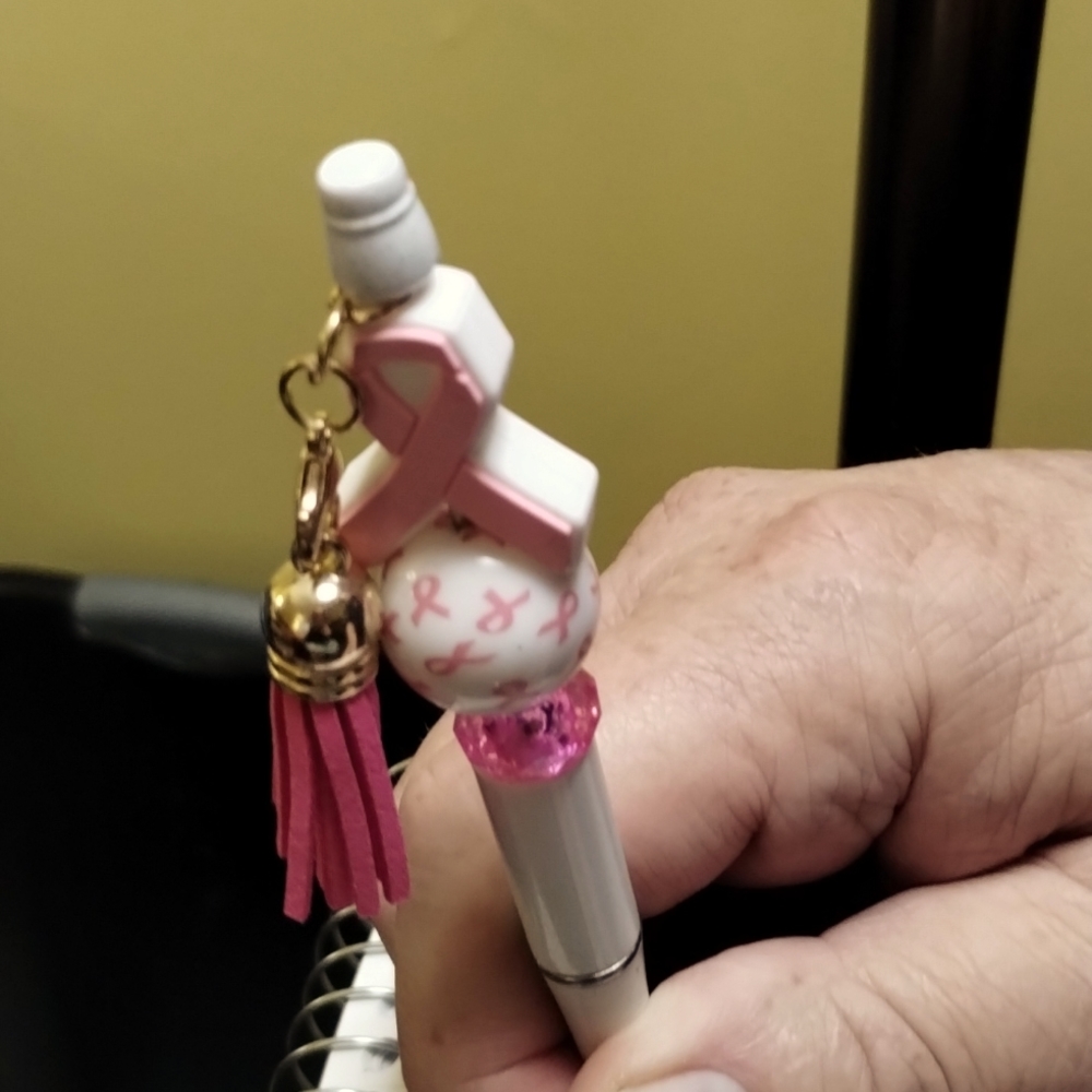 Support breast cancer pen !5.00 of proceeds go to Susan B Komen Foundation!